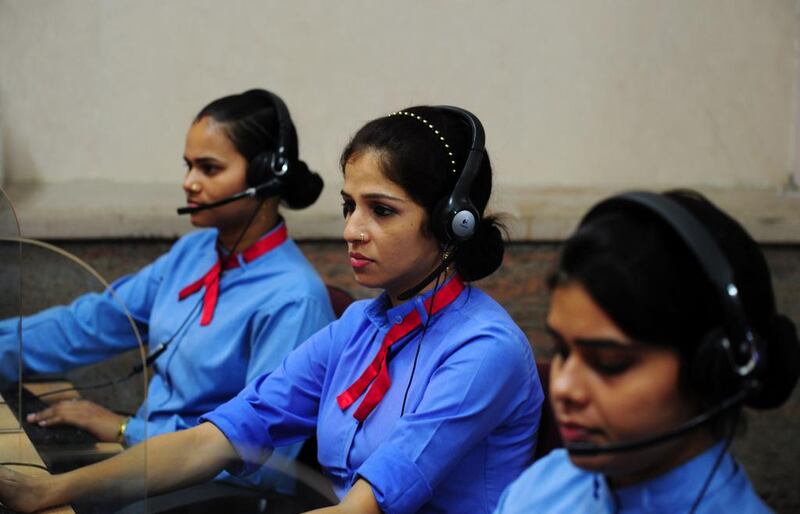 Indian helpline operators work at the women’s ‘Power Helpline 1090’ call centre in Lucknow, Uttar Pradesh. A series of rapes and killings have been fuelling calls for the state to be brought under central government control.  Sanjay Kanojia/AFP Photo