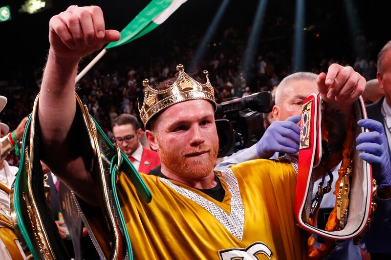 Canelo Alvarez, of Mexico, celebrates after defeating Caleb Plant. AP Photo