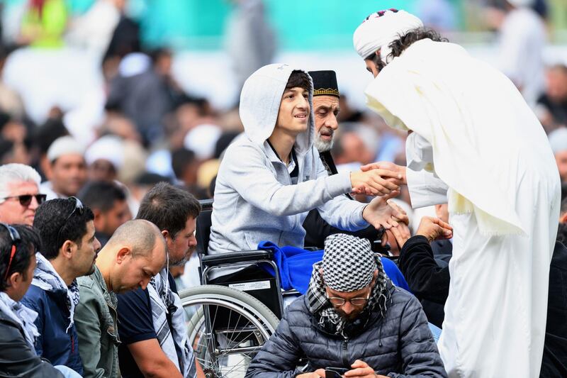 CHRISTCHURCH, NEW ZEALAND - MARCH 22: Zahid Mustafa (C), whose father Khaled Mustafa and brother Hamza Mustafa were killed at Al Noor mosque, attends Friday prayers in Hagley Park near Al Noor mosque on March 22, 2019 in Christchurch, New Zealand. 50 people were killed, and dozens were injured in Christchurch on Friday, March 15 when a gunman opened fire at the Al Noor and Linwood mosques. The attack is the worst mass shooting in New Zealand's history. (Photo by Kai Schwoerer/Getty Images)