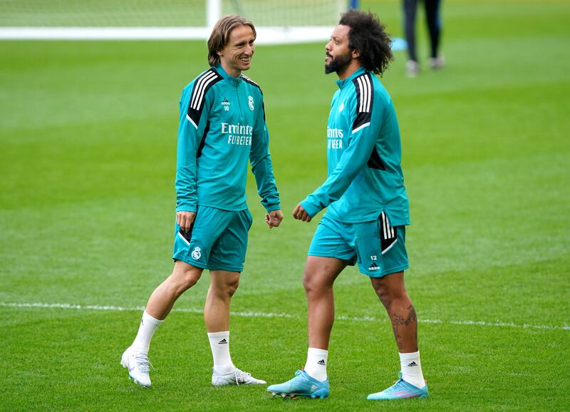 Luka Modric and Marcelo during the training session. PA