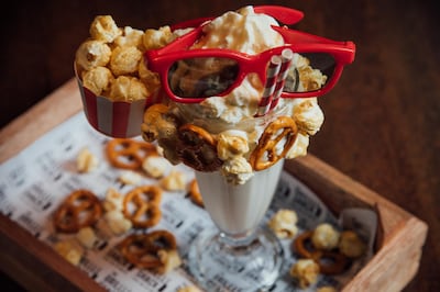 3D Caramel Popcorn MilkShack is topped with salted pretzel and caramel popcorn. Courtesy Grill Shack