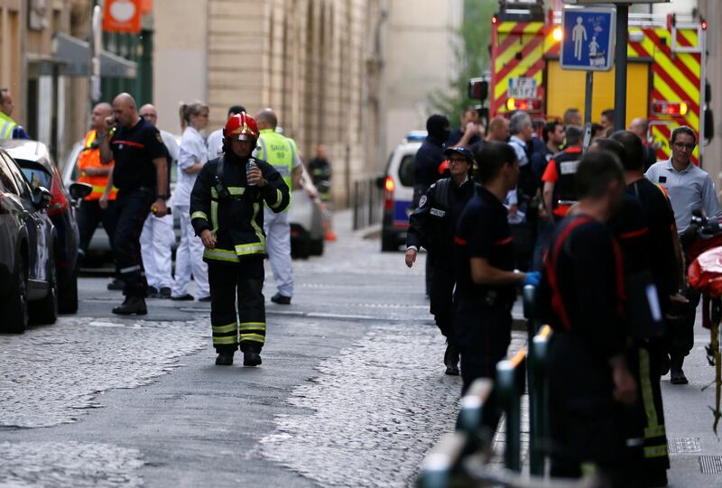Fire fighters and medics attended the site of the explosion in central Lyon. Reuters