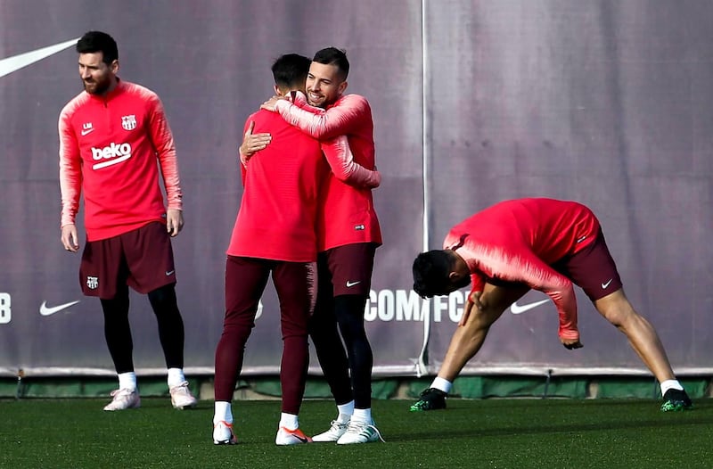 Lionel Messi, left, Jordi Alba, second right, and Barcelona players take part in a training session. EPA