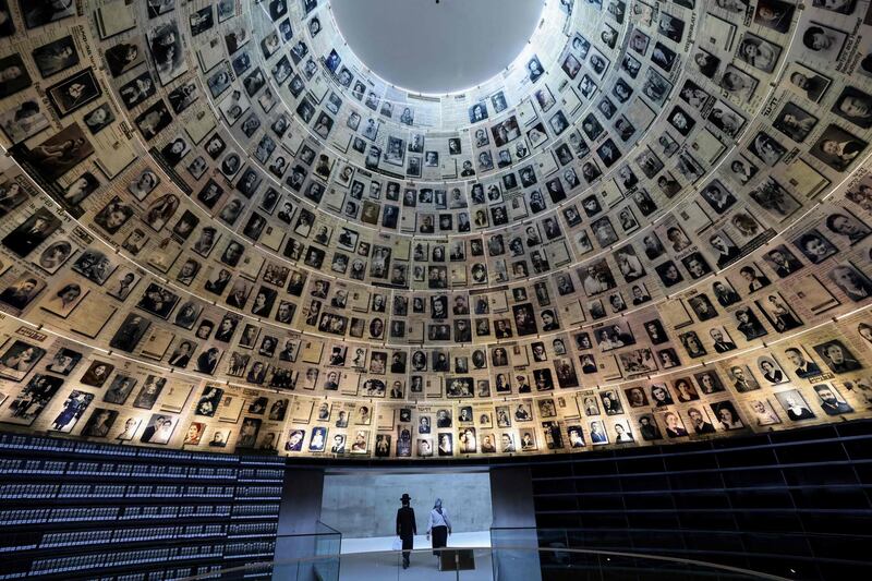 Visitors walk from the Hall of Names at Yad Vashem, the World Holocaust Remembrance Centre, in Jerusalem, on the eve of ceremonies marking Israel's Holocaust Remembrance Day. AFP
