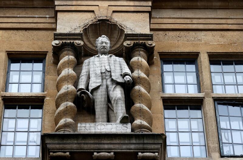 A statue of Cecil Rhodes, a controversial historical figure, is seen outside Oriel College, following demonstrations for it's removal in the aftermath of protests against the death of George Floyd, who died in police custody in Minneapolis, in Oxford, Britain, June 18, 2020. REUTERS/Eddie Keogh