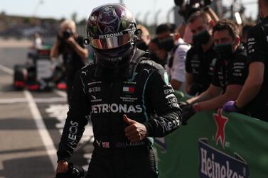 Lewis Hamilton continued his domination of the Formula One season by claiming pole position at the Portuguese Grand Prix on Saturday. EPA