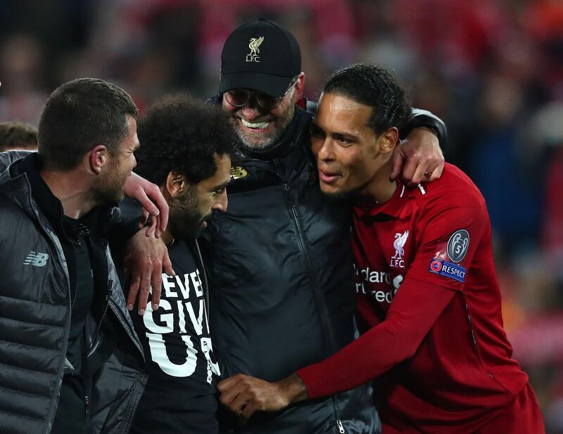 Jurgen Klopp, Mohamed Salah and Virgil van Dijk celebrate. Getty Images