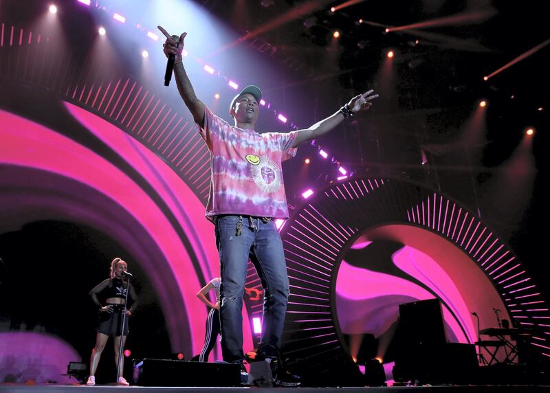 Pharrell Williams performs on stage during the Global Citizen Festival G20 benefit concert at the Barclaycard Arena in Hamburg, northern Germany on July 6, 2017 on the eve of the G20 summit. - Leaders of the world's top economies will gather from July 7 to 8, 2017 in Germany for likely the stormiest G20 summit in years, with disagreements ranging from wars to climate change and global trade. (Photo by RONNY HARTMANN / AFP)