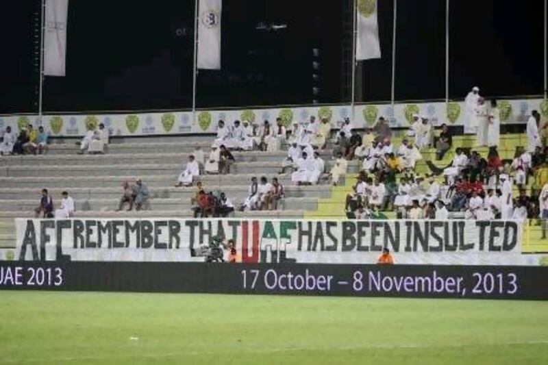 DUBAI , UNITED ARAB EMIRATES - Oct 16 : Banner for AFC put up during the International friendly football match between UAE vs Bahrain at Al Wasl club in Dubai. UAE won the match by 6-2. ( Pawan Singh / The National ) For Sports. Story by Ahmed