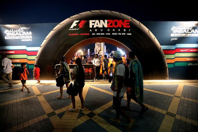 Fans cheers at the F1 FanZone along the Abu Dhabi Corniche. Satish Kumar / The National