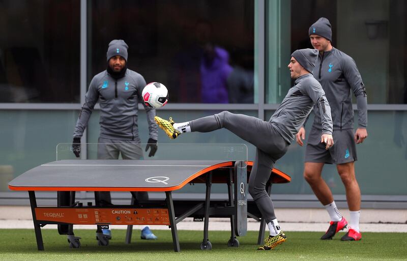 Tottenham Hotspur's Lucas Moura, Giovani Lo Celso and Eric Dier during training. Reuters