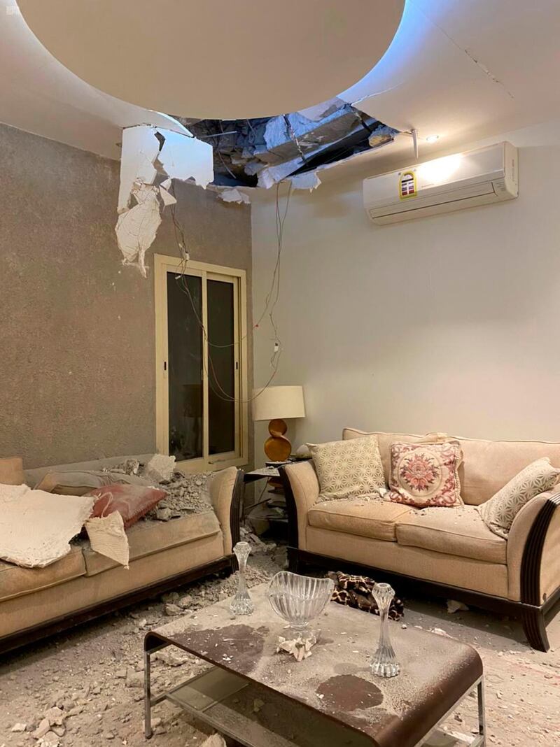 Damage to a home in Saudi Arabia's capital Riyadh, caused by debris from a ballistic missile launched by Yemen's Houthi rebels. SPA via AP