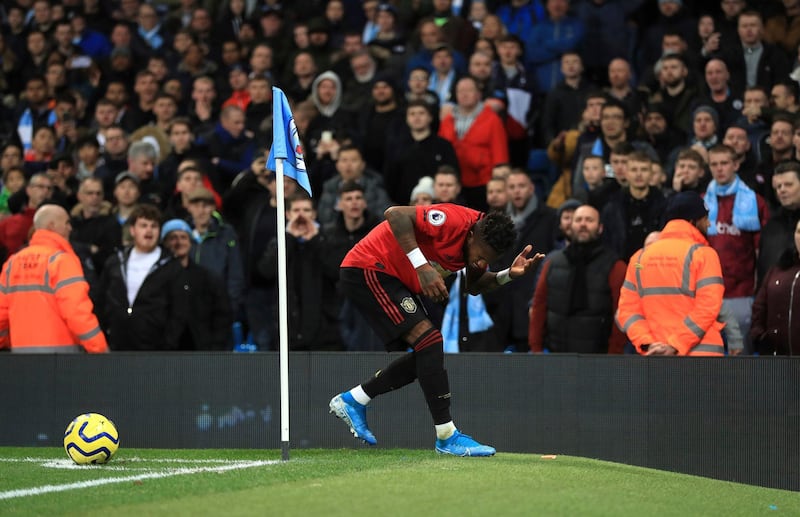 Manchester United's Fred reacts after objects are thrown at him during the English Premier League soccer match at the Etihad Stadium, Manchester, England Saturday Dec. 7, 2019. (Mike Egerton/PA via AP)