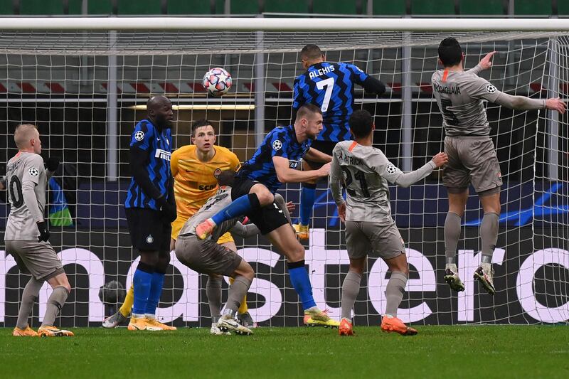 Inter forward Alexis Sanchez heads on goal. AFP