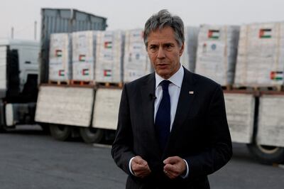 US Secretary of State Antony Blinken in front of a lorry carrying humanitarian aid for Gaza at the Jordanian Hashemite Charity Organisation in Amman. Reuters