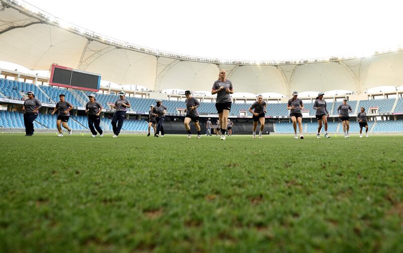 Warriors players run during training at the Dubai International Stadium. AFP