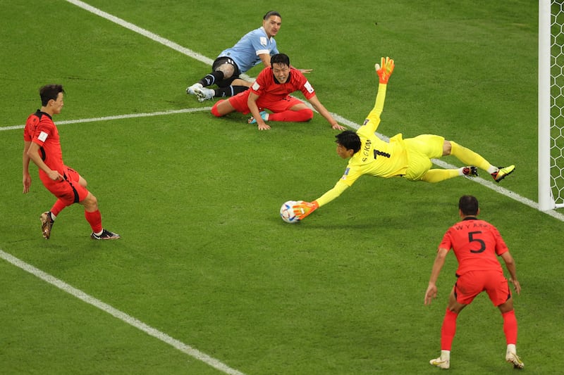 South Korea's goalkeeper Kim Seung-gyu makes a save. AFP
