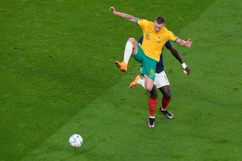 Australia's Mitchell Duke goes for the ball against Dayot Upamecano. AP 