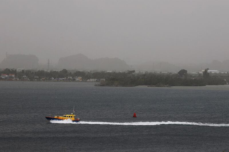 A view of an immense cloud of dust from the Sahara covering the municipality of Bayamon, from San Juan, Puerto Rico.  EPA