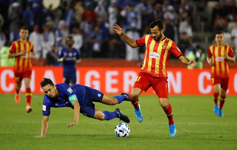 Esperance Sportive de Tunis' Taha Khenissi in action with Al Hilal's Carlos Eduardo. Reuters
