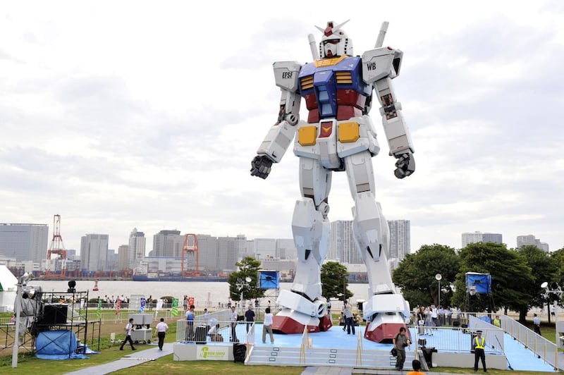 An 18-metre tall statue of popular TV animation hero, Gundam, at a Tokyo park. Yoshikazu Tsuno / AFP photo

