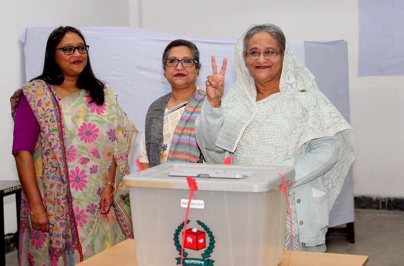 Prime Minister Sheikh Hasina gestures after casting her vote in Dhaka. Reuters