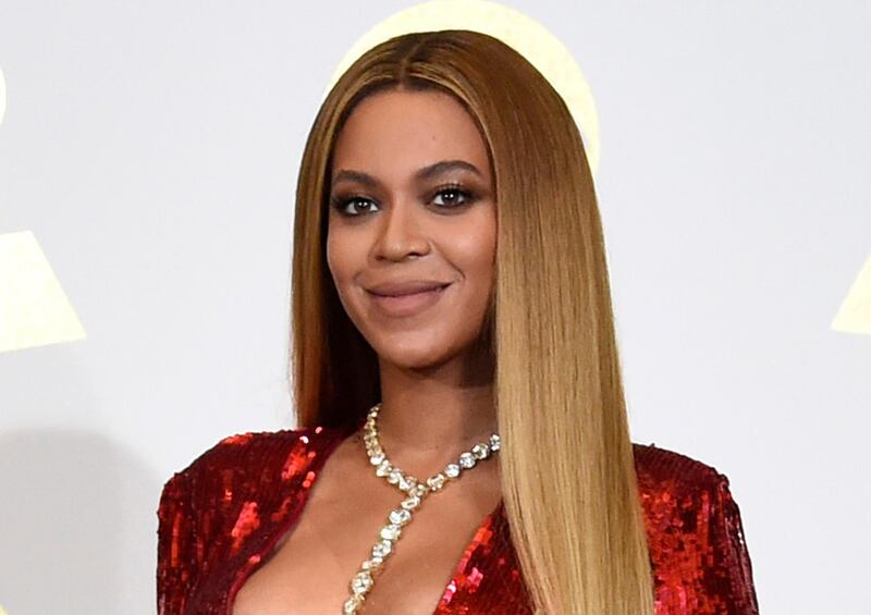 FILE - In this Feb. 12, 2017 file photo, Beyonce poses in the press room at the 59th annual Grammy Awards in Los Angeles. The singer has advocated plant-based living in a rare social media endorsement. She and her husband Jay - Z wrote the introduction for  "The Greenprint: Plant-Based Diet, Best Body, Better World," by Marco Borges, a plant-based guru who has worked with the couple. (Photo by Chris Pizzello/Invision/AP, File)