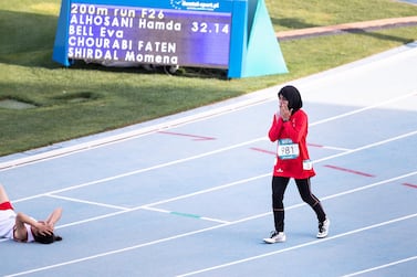 Hamda Al Hosani wins the gold medal for the 200-metre run for the Special Olympics World Games at Dubai Police Academy Stadium. Reem Mohammed / The National