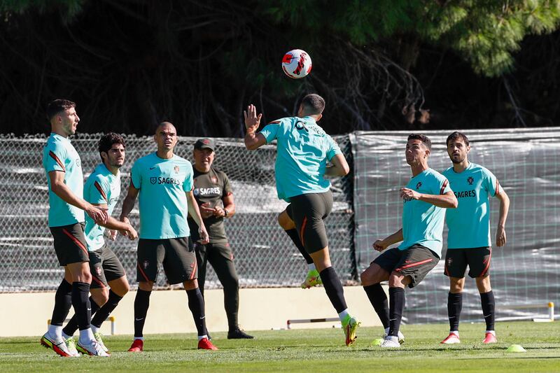 Ruben Dias, Pepe, Cristiano Ronaldo and Bernardo Silva attend a training session in Almancil. EPA