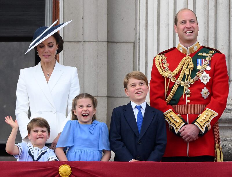 Prince William and his wife Kate with their children Prince Louis, Princess Charlotte and Prince George on the balcony of Buckingham Palace at the queen's platinum jubilee celebrations. AFP