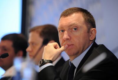 (FILES) In this file photo taken on April 12, 2010 Oleg Deripaska (R), CEO of Russian metals giant UC Rusal, takes part in a press conference to announce the company's 2009 annual results in Hong Kong on April 12, 2009.  Russian oligarch Oleg Deripaska filed suit against the US Treasury on March 15, 2019, accusing it of illegally targeting him for sanctions and victimizing him as part of the Russia meddling investigation. The suit, which named the US Treasury, Treasury Secretary Steven Mnuchin, and Andrea Gacki, the head of the Treasury's sanctions unit, said Deripaska had seen his net worth drop by $7.5 billion after sanctions were imposed on him and six other Russian oligarchs on April 6, 2018.
 / AFP / Mike CLARKE
