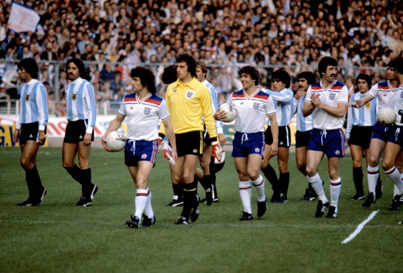 File photo dated 13-05-1980 - England's Kevin Keegan, Ray Clemence, Kenny Sansom and David Johnson walk onto the pitch at Wembley for the friendly against Argentina. PA Photo
