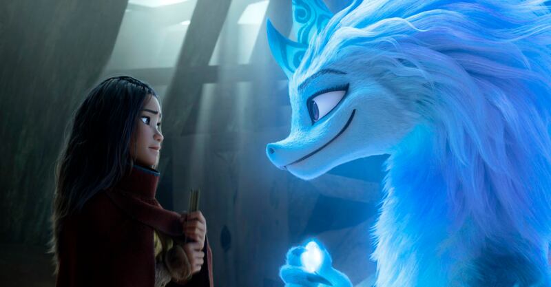 Raya, left, voiced by Kelly Marie Tran, with Sisu the dragon in a scene from 'Raya and the Last Dragon', which is up for Best Animated Feature Film. Disney+ via AP