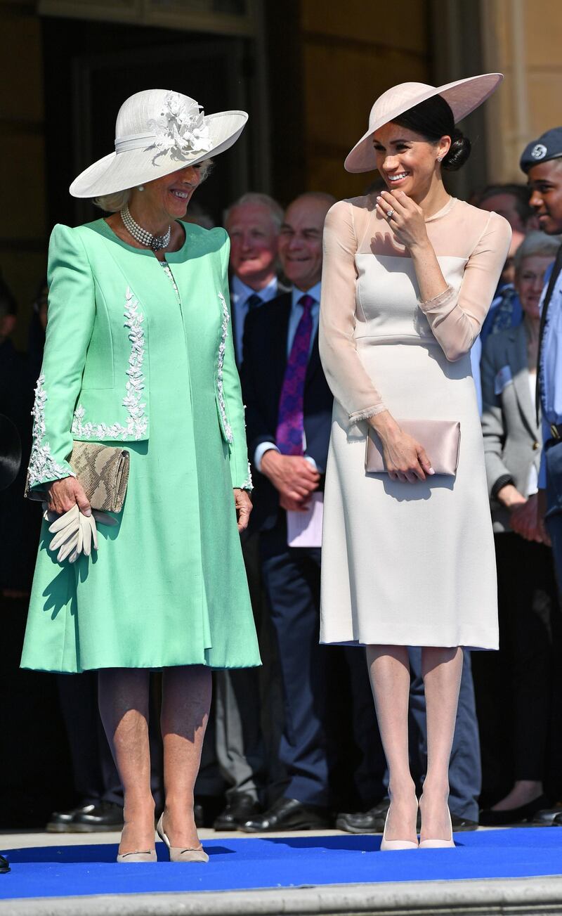 LONDON, ENGLAND - MAY 22:  Camilla, Duchess of Cornwall and Meghan, Duchess of Sussex attend The Prince of Wales' 70th Birthday Patronage Celebration held at Buckingham Palace on May 22, 2018 in London, England.  (Photo by Dominic Lipinski - Pool/Getty Images)