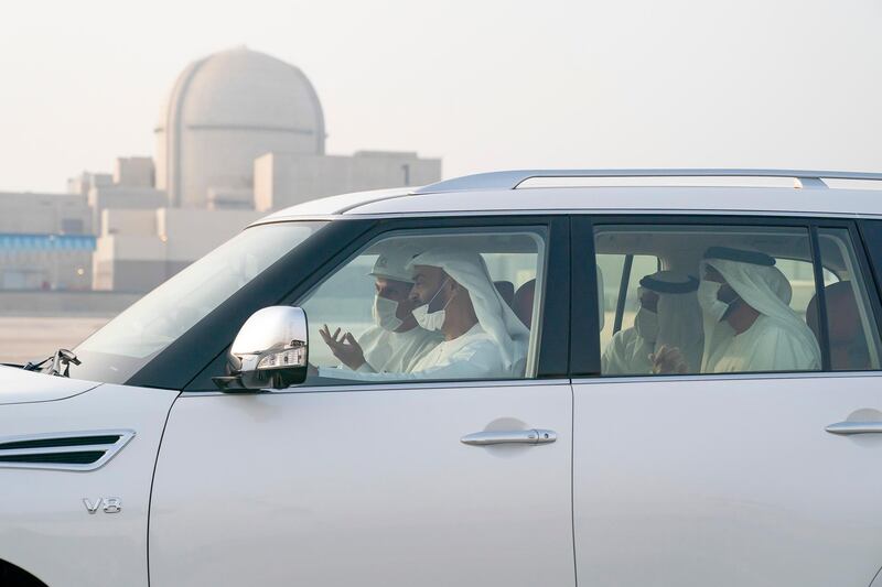 AL DHAFRA, ABU DHABI, UNITED ARAB EMIRATES - June 11, 2020: HH Sheikh Mohamed bin Zayed Al Nahyan, Crown Prince of Abu Dhabi and Deputy Supreme Commander of the UAE Armed Forces (R in vehicle) inspects the Barakah Peaceful Nuclear Energy Plants, in Barakah. Seen with HE Khaldoon Khalifa Al Mubarak, CEO and Managing Director Mubadala, Chairman of the Abu Dhabi Executive Affairs Authority and Abu Dhabi Executive Council Member (L in vehicle), HH Sheikh Nahyan Bin Zayed Al Nahyan, Chairman of the Board of Trustees of Zayed bin Sultan Al Nahyan Charitable and Humanitarian Foundation (Back R in vehicle) and HH Sheikh Sultan bin Hamdan bin Mohamed Al Nahyan (Back L in vehicle).

( Mohamed Al Hammadi / Ministry of Presidential Affairs )
---