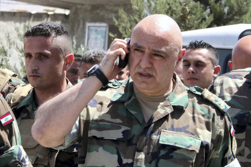 Lebanese army chief General Joseph Aoun arrives at an operational command post in the eastern town of Ras Baalbek, on August 23, 2017, as troops are conducting an operation against the Islamic State (IS) group on the country's border with Syria. / AFP PHOTO / STRINGER