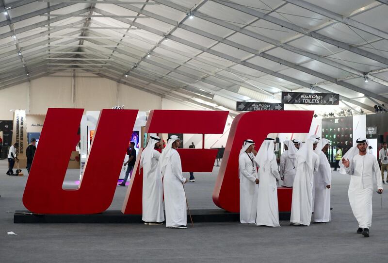 Abu Dhabi, United Arab Emirates - September 06, 2019: People gather at the UFC fan zone. Friday the 6th of September 2019. Yes Island, Abu Dhabi. Chris Whiteoak / The National