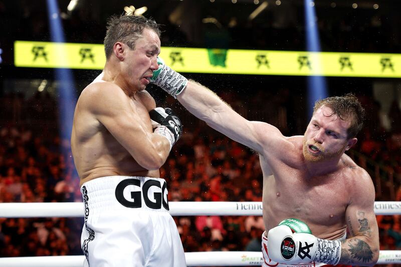 Canelo Alvarez lands a punch on Gennady Golovkin in their fight at T-Mobile Arena. Getty