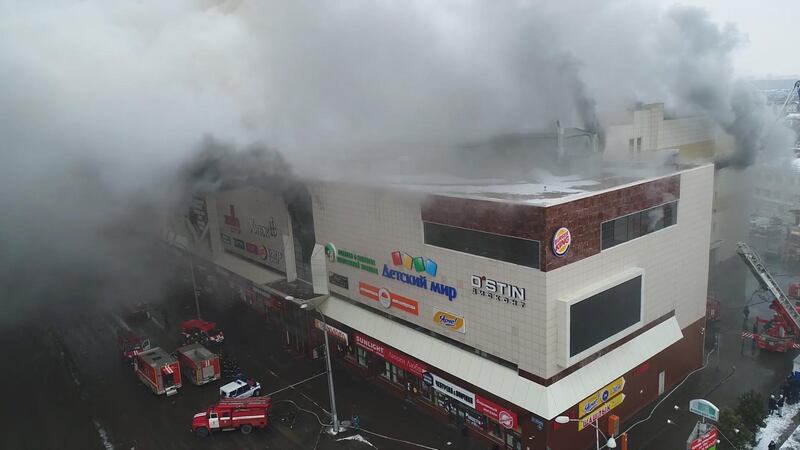 A still photo taken from video provided by Russian Emergencies Ministry shows a site of a fire at a shopping mall in Kemerovo, Russia. Russian Emergencies Ministry / Handout via Reuters