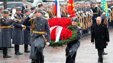 Russian President Vladimir Putin takes part in a wreath-laying ceremony at the Tomb of the Unknown Soldier in Moscow, on Defender of the Fatherland Day on Friday. AP