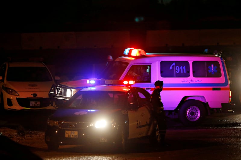 An ambulance on a highway near the Jordanian capital of Amman. A senior Jordanian police officer has been killed during protests in Jordan's southern city of Al Husseiniya. Reuters