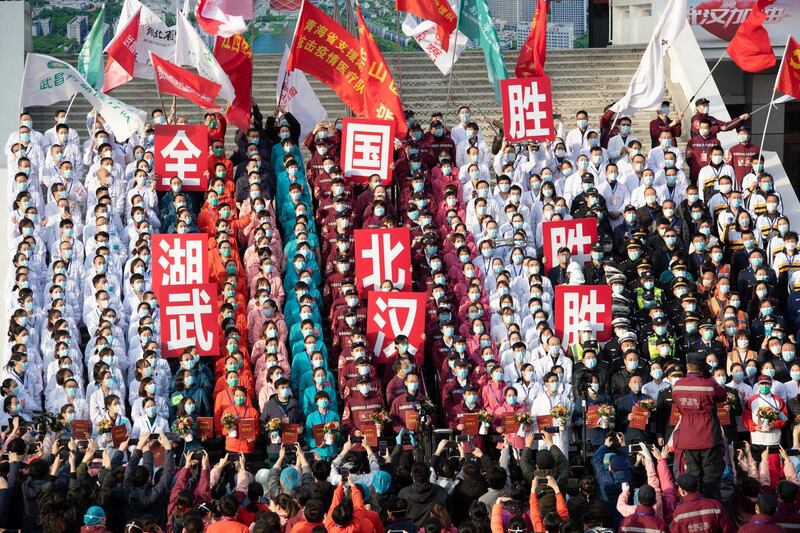 Medical workers and security personnel attend a ceremony marking the closure of the last makeshift hospital in Wuhan, the epicentre of the coronavirus outbreak, following the discharge of its last batch of coronavirus patients, in Hubei province, China. Reuters