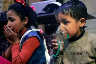 A child receiving oxygen through a respirator following an alleged poison gas attack in Douma on April 8, 2018. Syrian Civil Defense White Helmets via AP