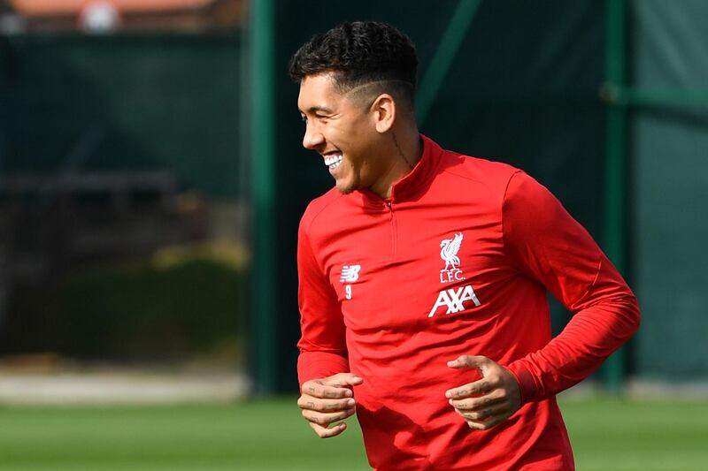 Liverpool's Brazilian striker Roberto Firmino takes part in a training session. AFP