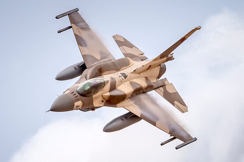 A Moroccan F-16 Fighting Falcon jets across the skies.