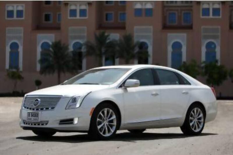 The new Cadillac XTS handles much better than its bulkier predecessors, but still sports plenty of interior room and a huge boot. Pawan Singh / The National