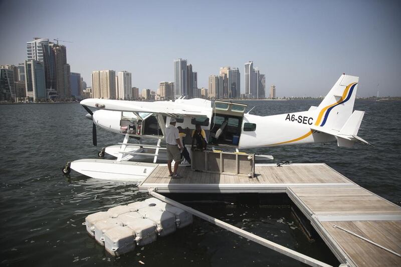 The Seawings charter service offers a 30-minute flight over Sharjah. The tour consists of a water take-off and landing in a Cessna 208 aircraft followed by an open-top bus tour around the city. Lee Hoagland / The National