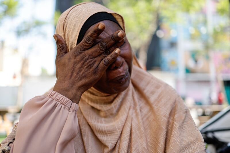 Suad Fissa, 40, an asylum seeker and factory worker from Darfur, cries as she speaks about her missing children in Tel Aviv, Israel, on June 24. Reuters