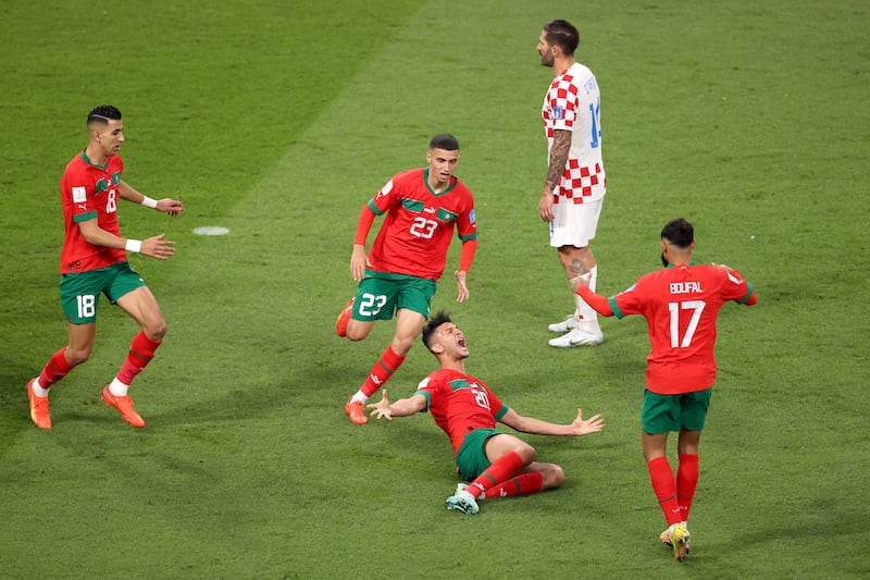 Morocco's Achraf Dari celebrates after levelling the tie. Getty Images