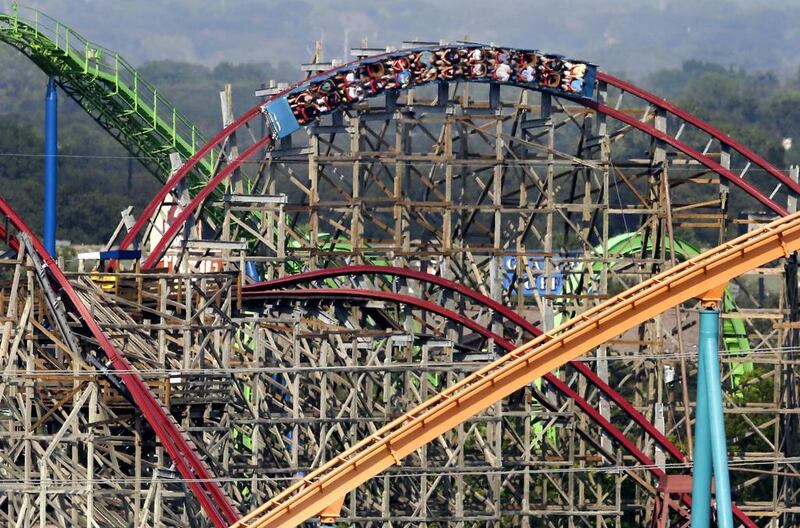 The green and orange tracks at the Six Flags Over Texas park. Six Flags executives met with Saudi Arabia’s Prince Mohammed but it is not building a theme park in the country. Tony Gutierrez / AP Photo 